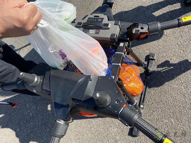 農(nóng)業(yè)無人機變身“運輸機”,上海奉賢用無人機服務隔離人員